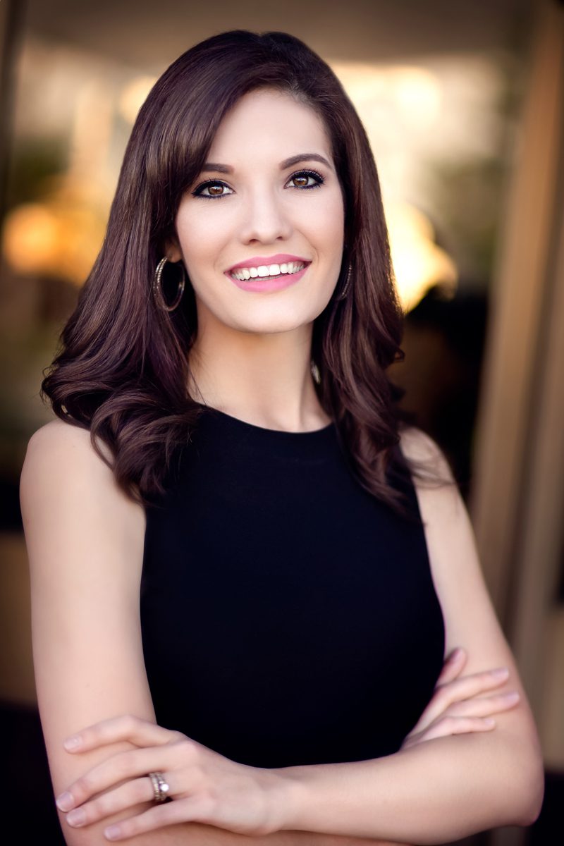 corporate headshot of woman real estate agent