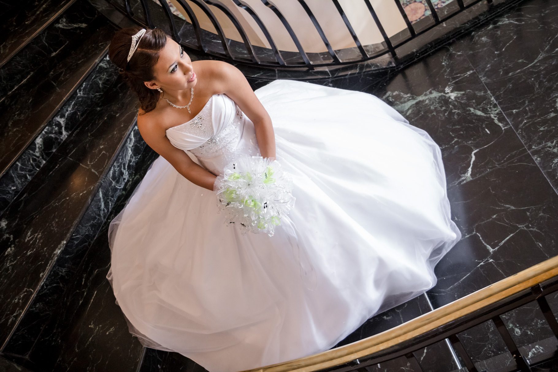 quinceanera portrait on steps of camino real hotel