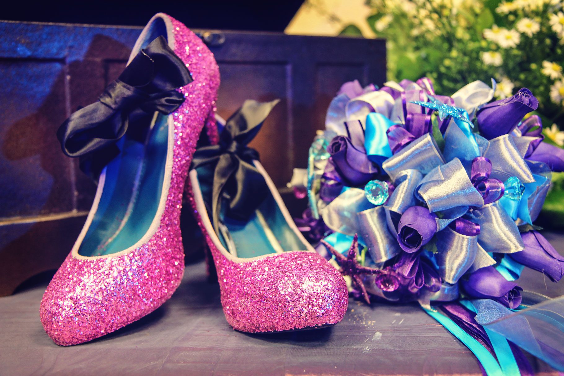 quinceanera sparkly pink shoes and purple bouquet